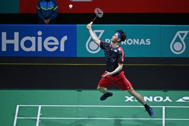 李梓嘉晋级羽毛球亚锦赛八强