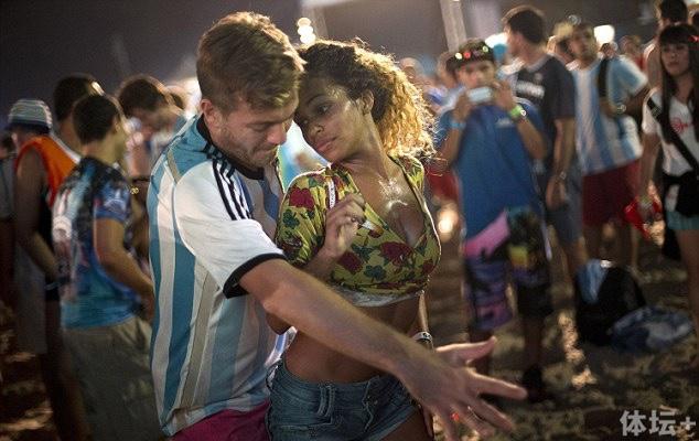 1404992438659_wps_1_A_woman_from_Brazil_and_a.jpg