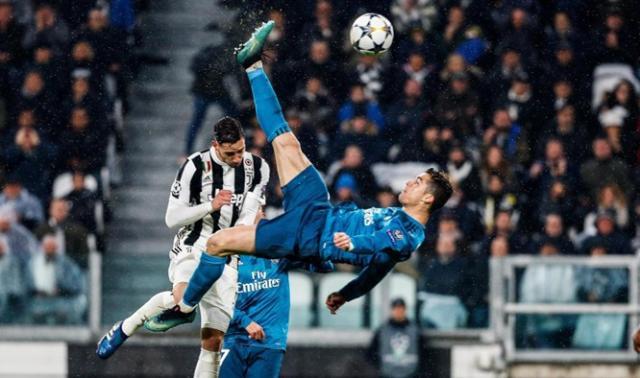 cristiano-ronaldo-score-a-goal-during-the-champions-league-quarterfinals-first-leg-match-between-juventus-and-real-madrid-on-3rd-april-2018-20180404084031-9996.jpg