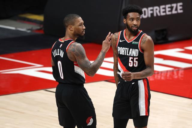DerrickJonesJr.DamianLillard_GettyImages-1297284208.jpg