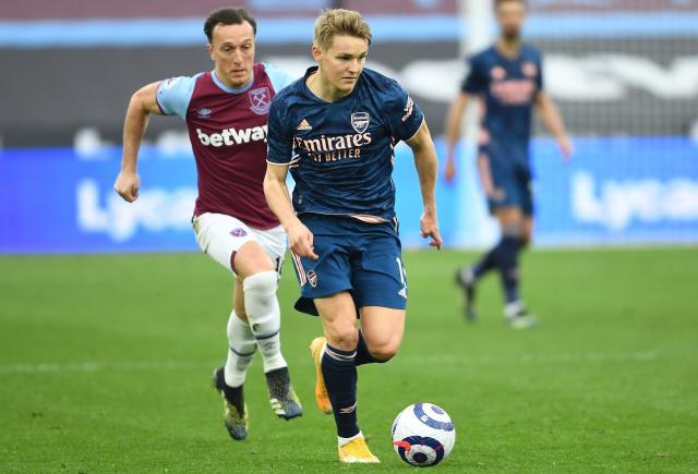 Odegaard-Arsenal-scaled-e1616354705187.jpg