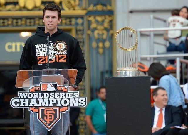 sf-giants-player-buster-posey-talking-at-podium-after-world-series-win-wire-3b71863c0ac46c52.jpg