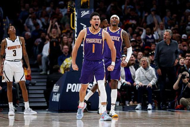 devin-booker-scores-49-at-nuggets-as-suns-clinch-top-seed-1648193791078.jpeg