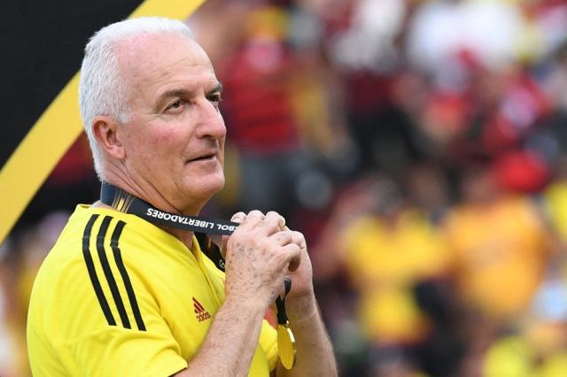 101004763-flamengos-brazilian-coach-dorival-junior-puts-the-medal-on-after-winning-the-copa-lib.jpg