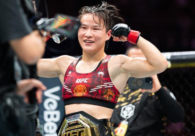 搏擊——UFC：張偉麗衛冕女子草量級金腰帶（1）XxjpseC007942_20250209_PEPFN0A001.jpg