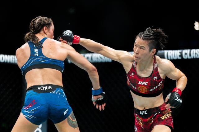 搏擊——UFC：張偉麗衛冕女子草量級金腰帶（3）XxjpseC007939_20250209_PEPFN0A001.jpg