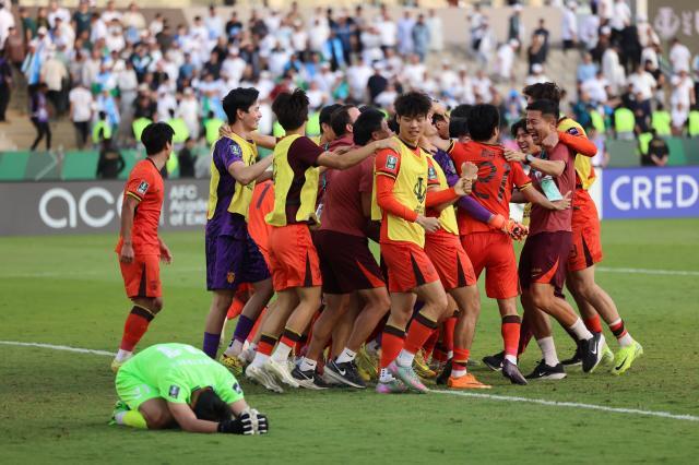 1774065522102099845.jpg (体育)(11)足球——U23亚洲杯:中国队晋级四强XxjpseC000002_20260118_PEPFN0A001.jpg